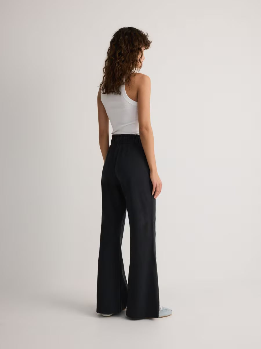 Utsvängda joggingbyxor -mörkgrå